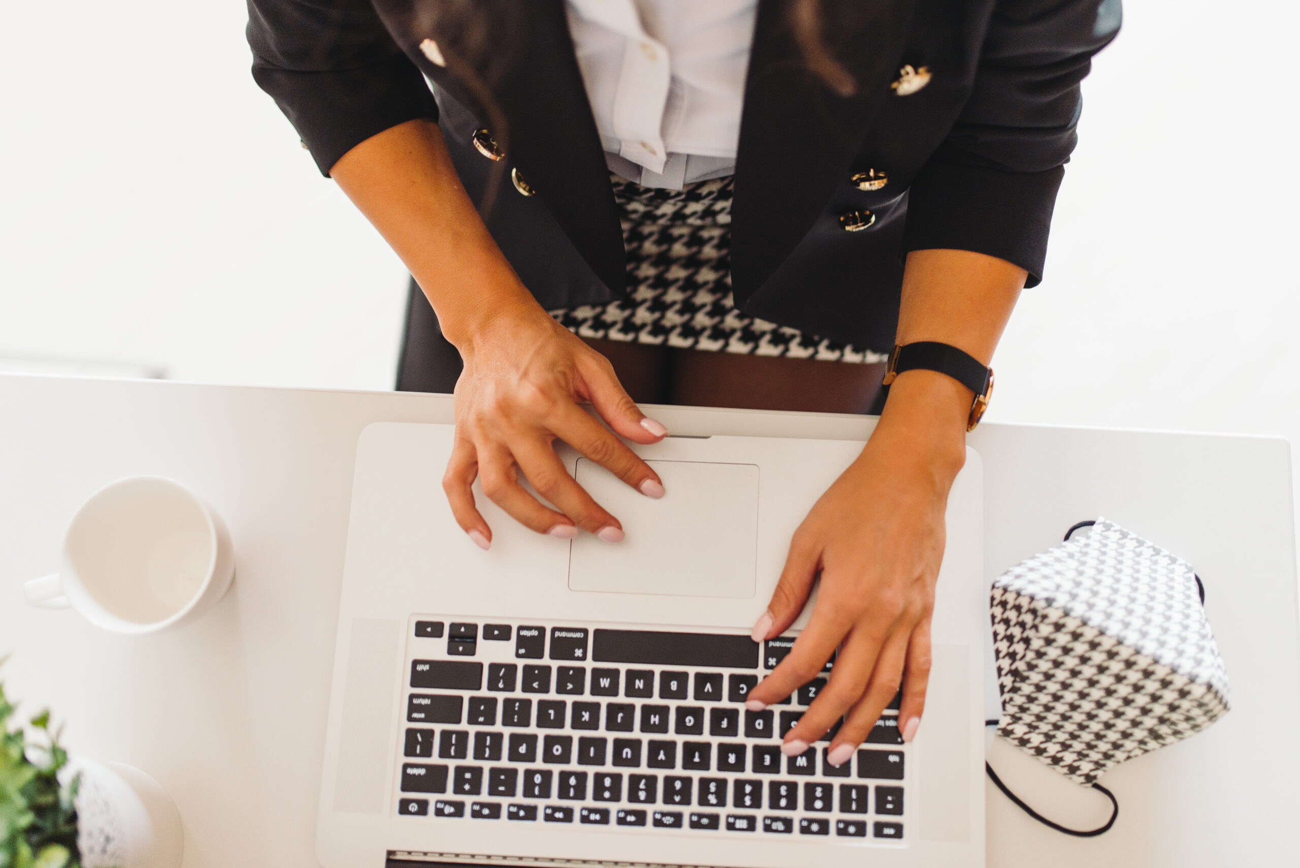 Business woman working on laptop.