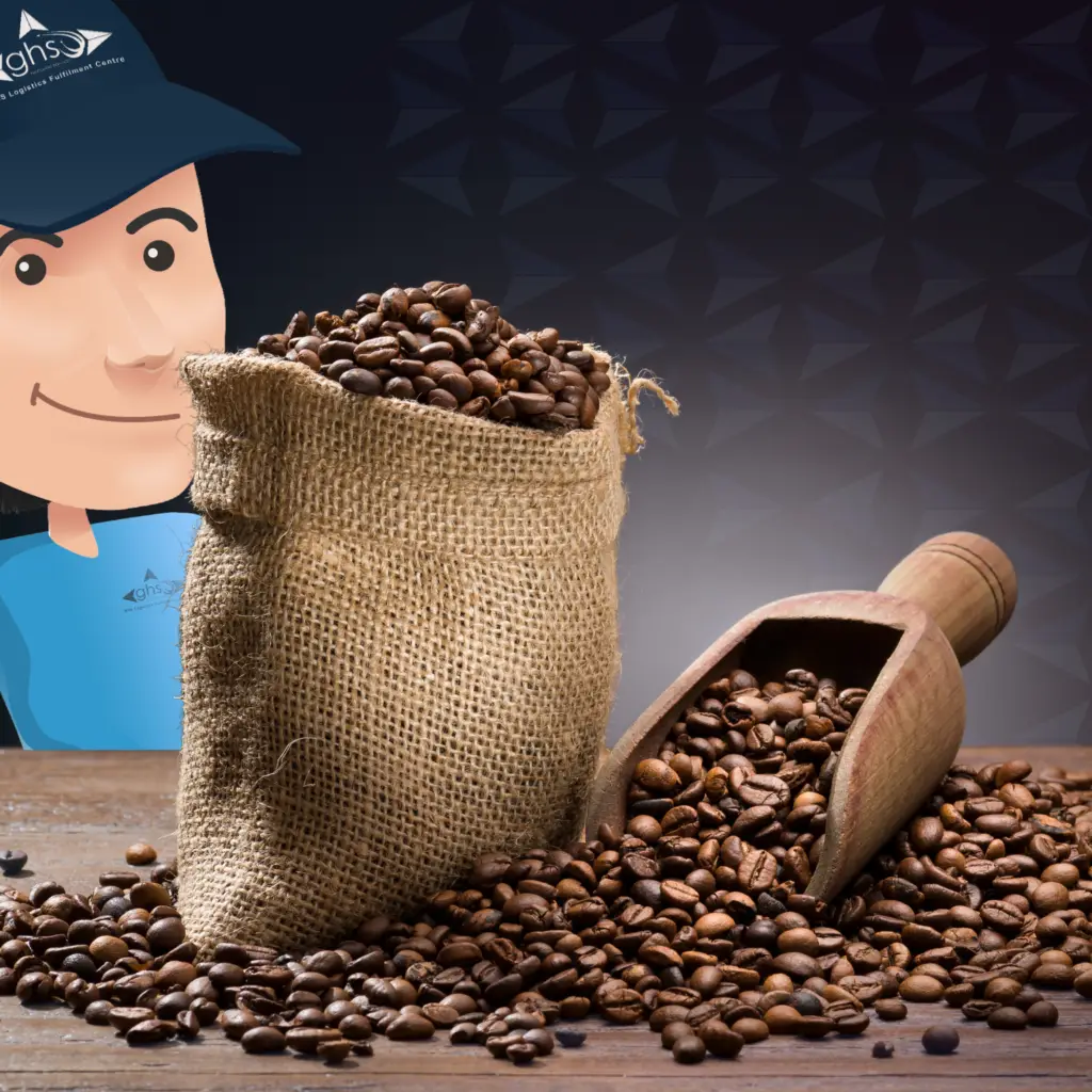 on a table an opened sack of coffee and with beans spreader , including GHS Logistics character "Max Delon" behind the table